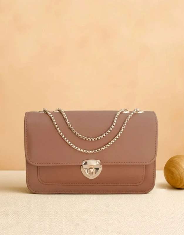 Rich brown PU leather crossbody bag with gold twist-lock, perfect for mehndi and formal events