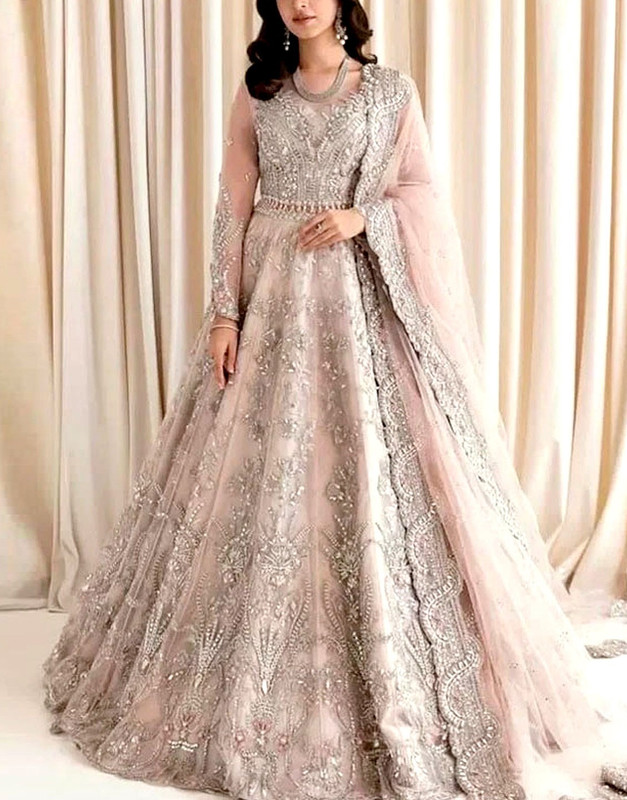 Luxurious Heavy Embroidered Net Bridal Wear Maxi 2026 with Handwork details.